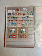 Soviet space stamps and Apollo-Soyuz souvenir sheets in the album – detail 11