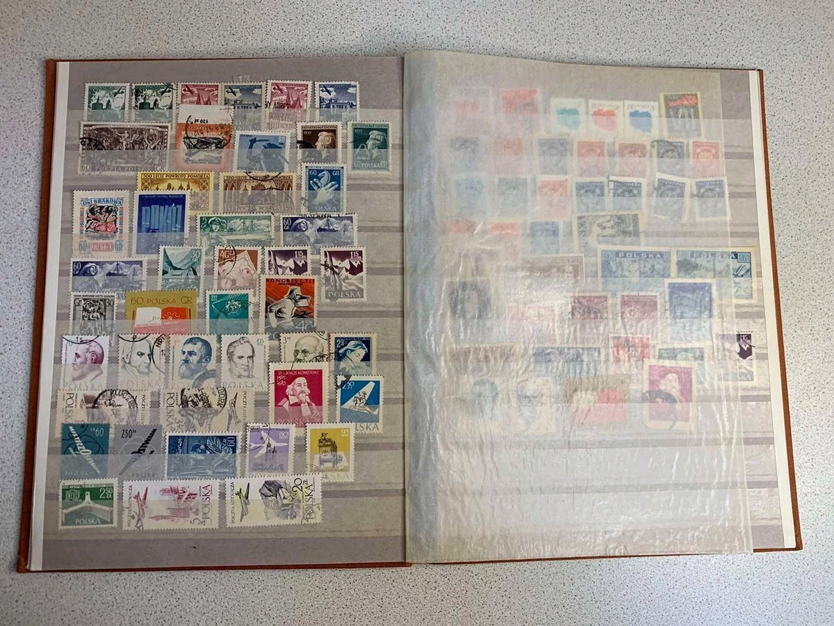 Soviet space stamps and Apollo-Soyuz souvenir sheets in the album – detail 14