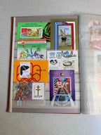 Soviet space stamps and Apollo-Soyuz souvenir sheets in the album