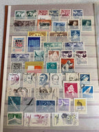 Eastern Bloc stamps arranged behind protective strips on album pages – detail 7