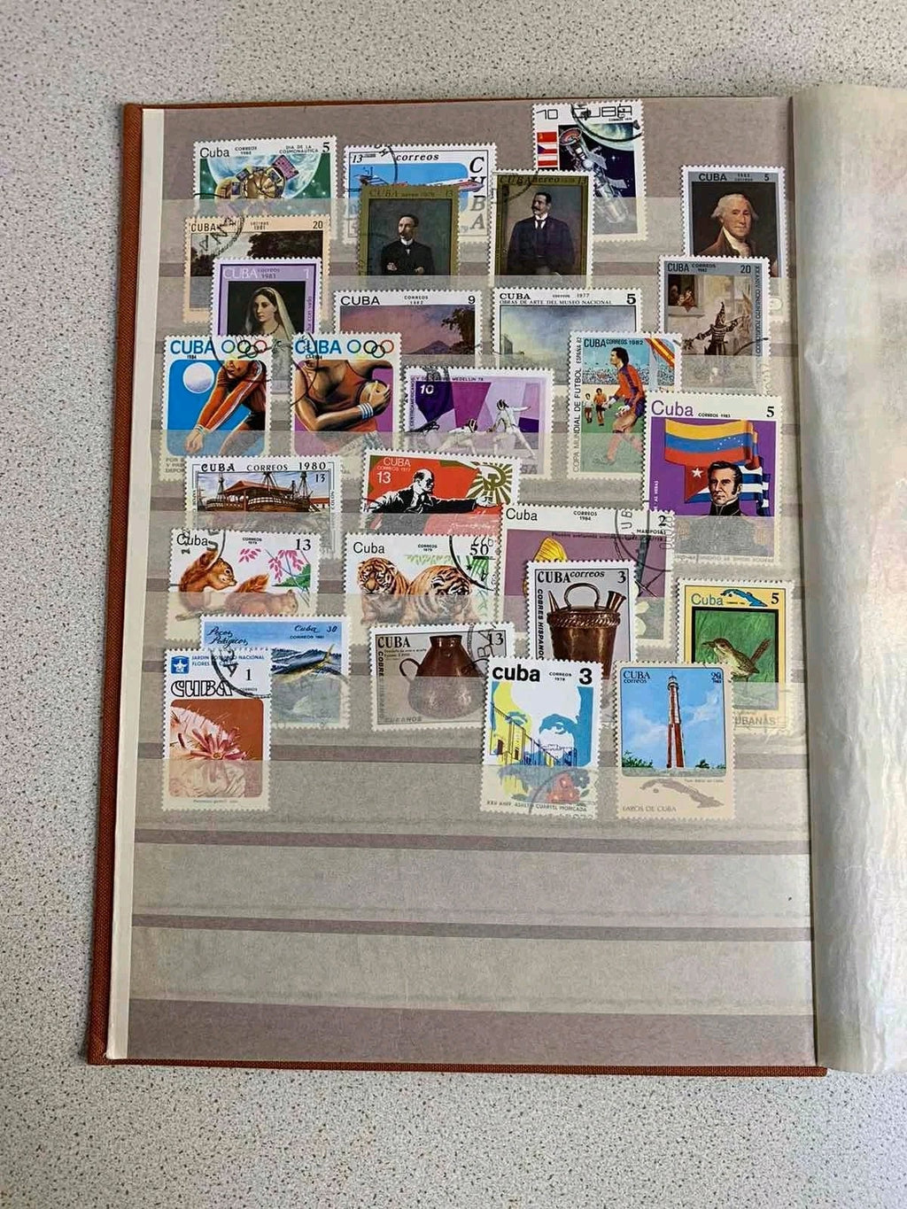 Soviet space stamps and Apollo-Soyuz souvenir sheets in the album – detail 8