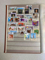 Soviet space stamps and Apollo-Soyuz souvenir sheets in the album – detail 8