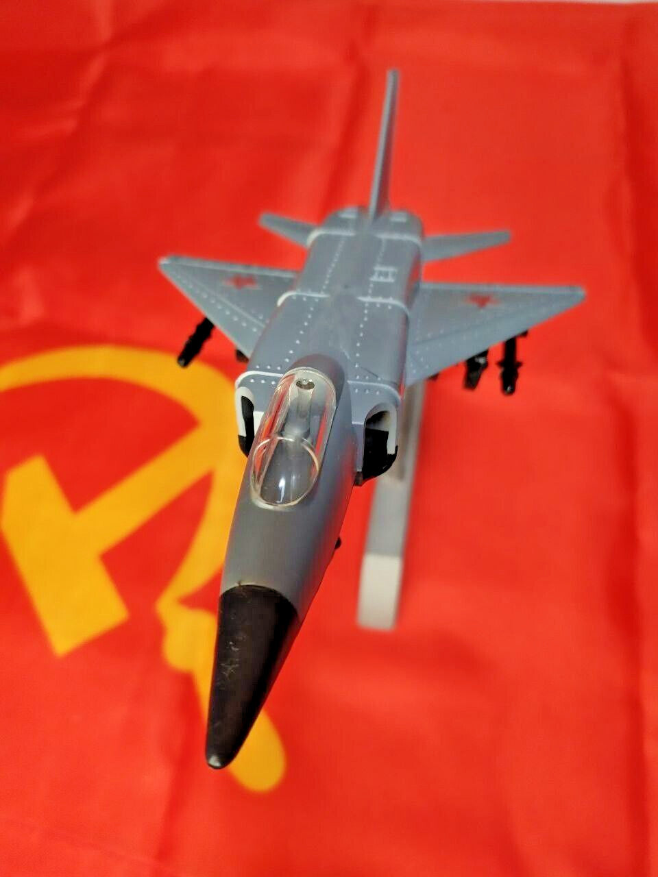 Silver plastic Su-15 interceptor model with decals intact
