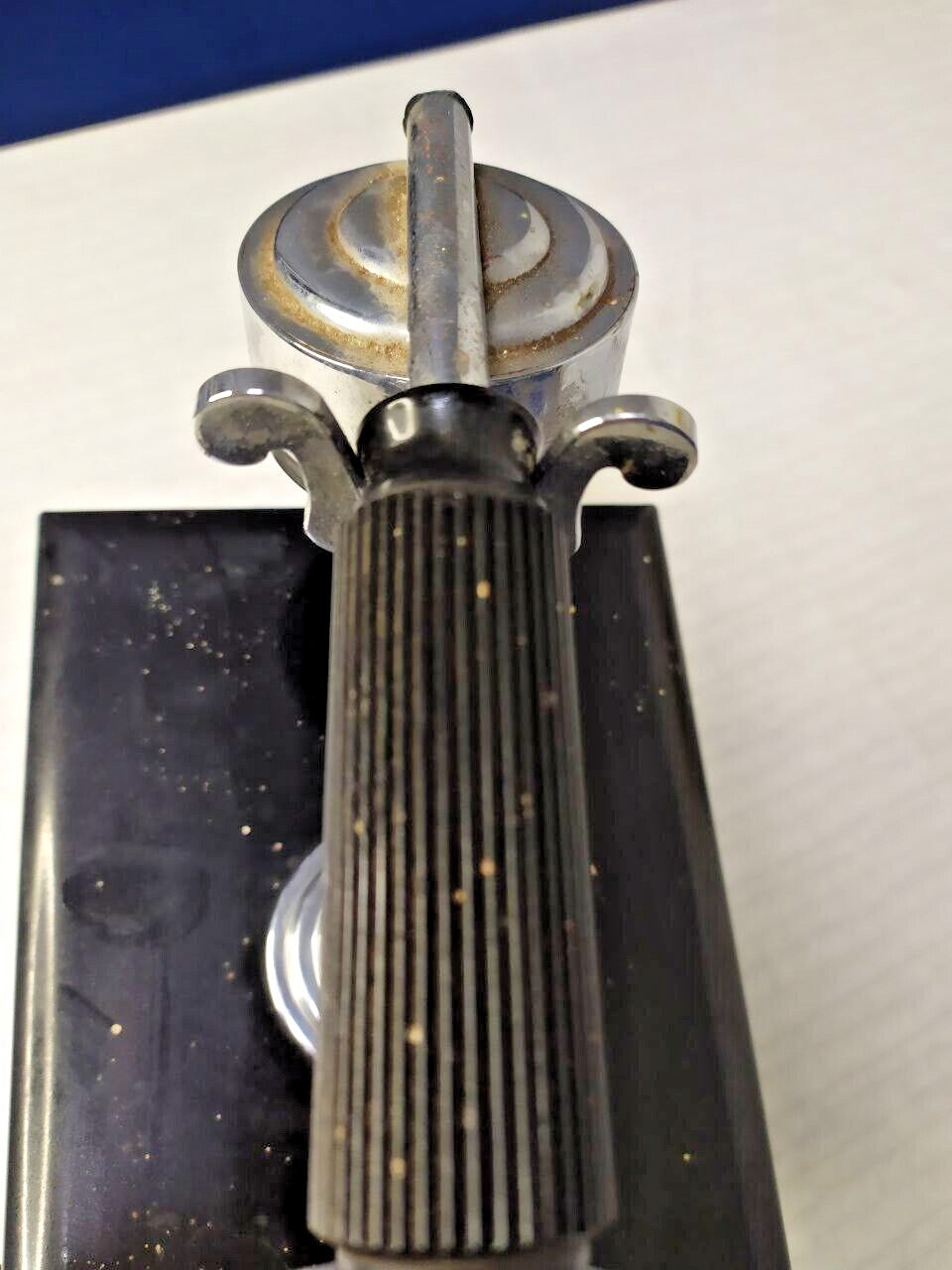 Chrome details and coiled handset cord of the commemorative Soviet phone – detail 7