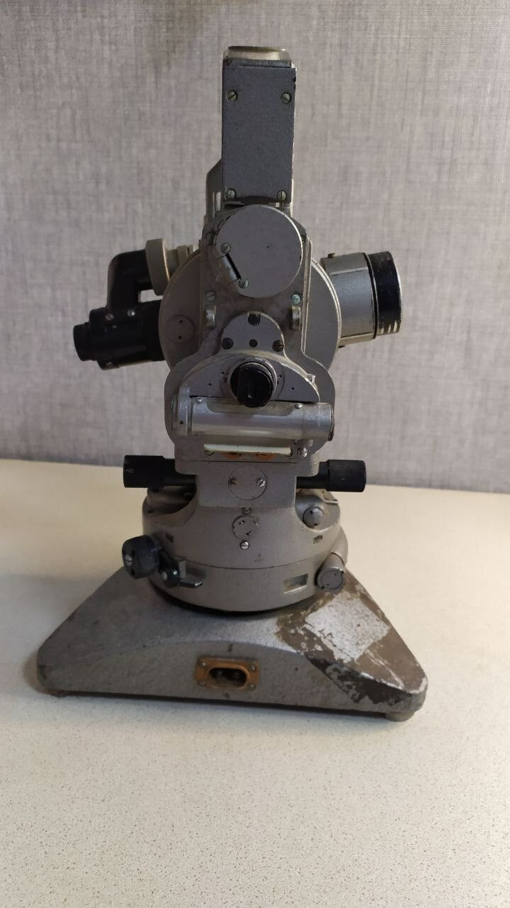 Vintage surveying instrument telescope and optics close-up