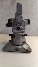 Vintage surveying instrument telescope and optics close-up