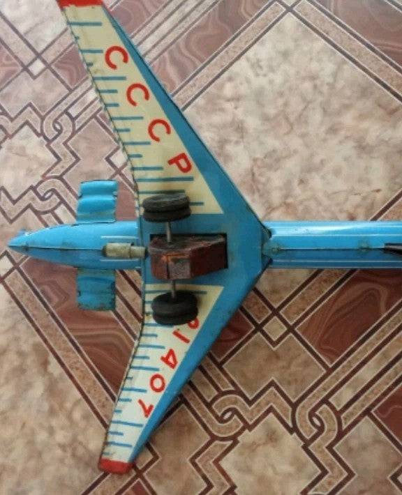 Front landing gear wheel of the vintage Soviet tin toy plane