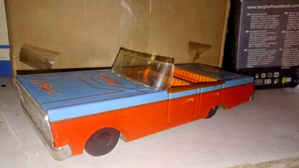 Soviet tin toy car Raduga, blue and orange lithographed open-top convertible