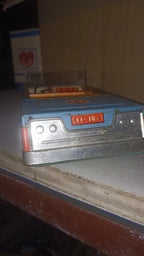 Lithographed dashboard and seat patterns inside the Raduga tin toy car – detail 5