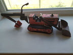 Soviet tin toy excavator bulldozer in red and black with plastic tracks
