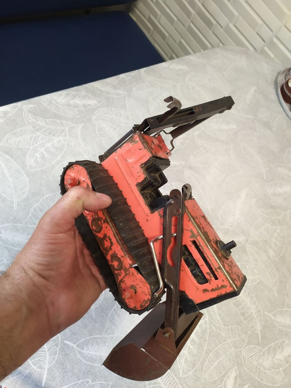Detached front bulldozer blade of the old Soviet toy with its mounting frame – detail 13