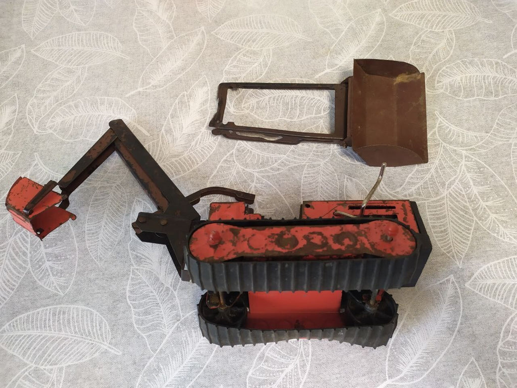Detached front bulldozer blade of the old Soviet toy with its mounting frame – detail 19
