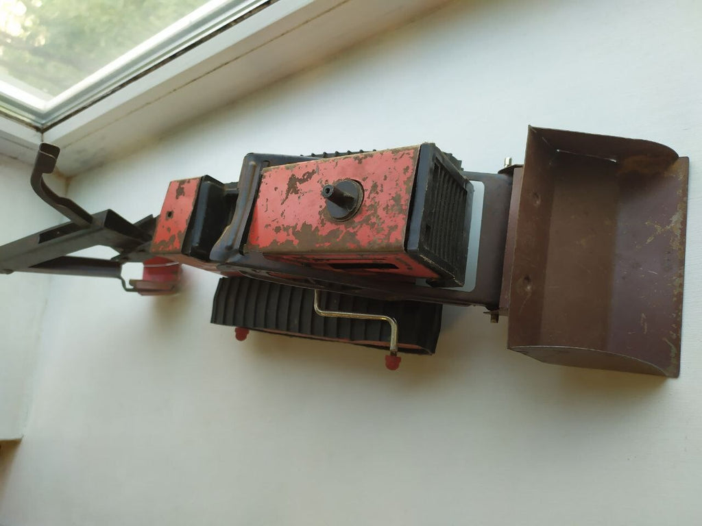 Vintage Soviet toy tracked digger with extended boom and bucket