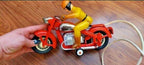Old Soviet toy motorcycle red lithographed tin body, side view