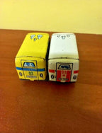 Two vintage USSR toy cars showing play wear and lithography loss