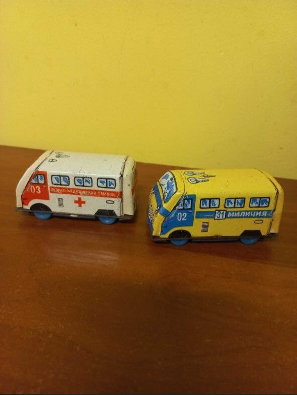 Two vintage USSR toy cars showing play wear and lithography loss – detail 7