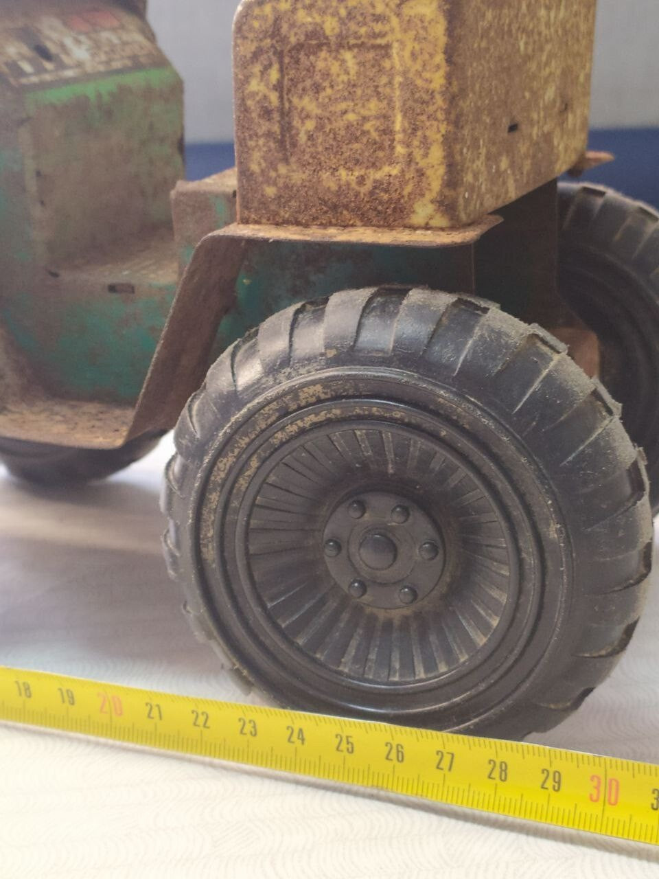 Old Soviet tin toy tractor side view with large rubber tires – detail 18