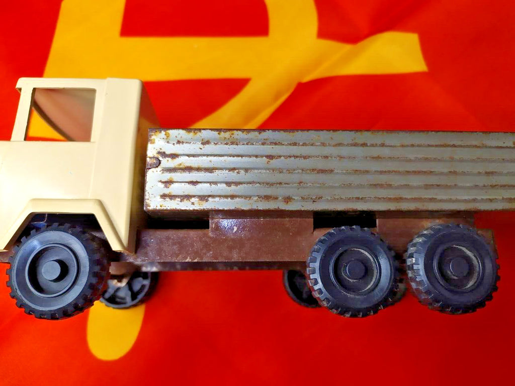 Soviet tin toy truck, 6-wheel cargo truck with beige plastic cab and tin cargo bed