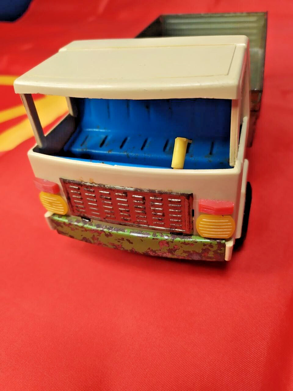 Three axles and wheels of the vintage Soviet tin toy cargo truck – detail 10