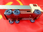 Blue seating and yellow steering wheel inside the USSR toy truck cab – detail 6
