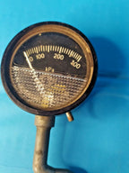 Vintage USSR tire gauge MD-214 white scale on black background