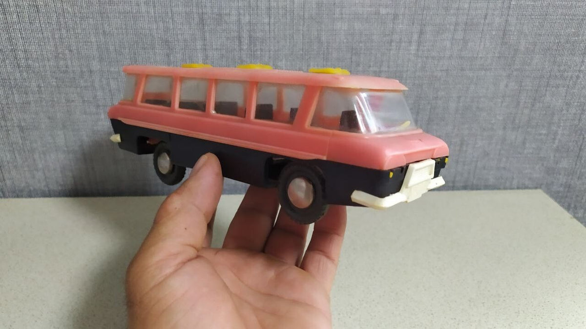 Vintage Soviet toy bus with wrap-around windshield and roof skylights – detail 11