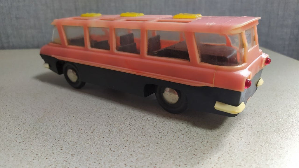 Vintage Soviet toy bus with wrap-around windshield and roof skylights – detail 5