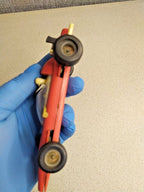 Red plastic Formula 1 toy measured at about 14.5 cm – detail 10