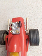 Red plastic Formula 1 toy measured at about 14.5 cm – detail 13