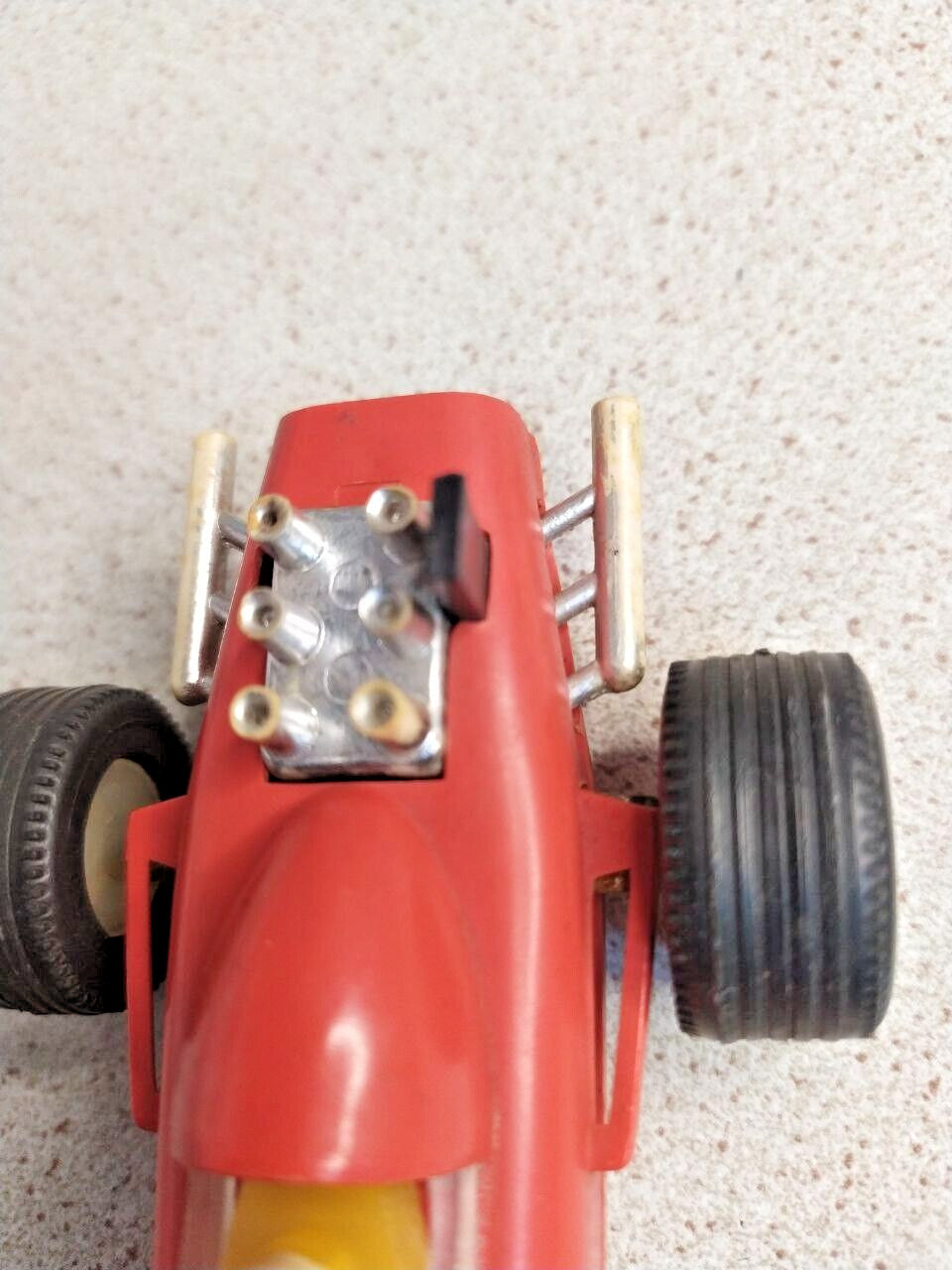 Red plastic Formula 1 toy measured at about 14.5 cm – detail 13