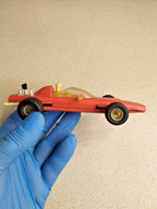 Red plastic Formula 1 toy measured at about 14.5 cm – detail 7