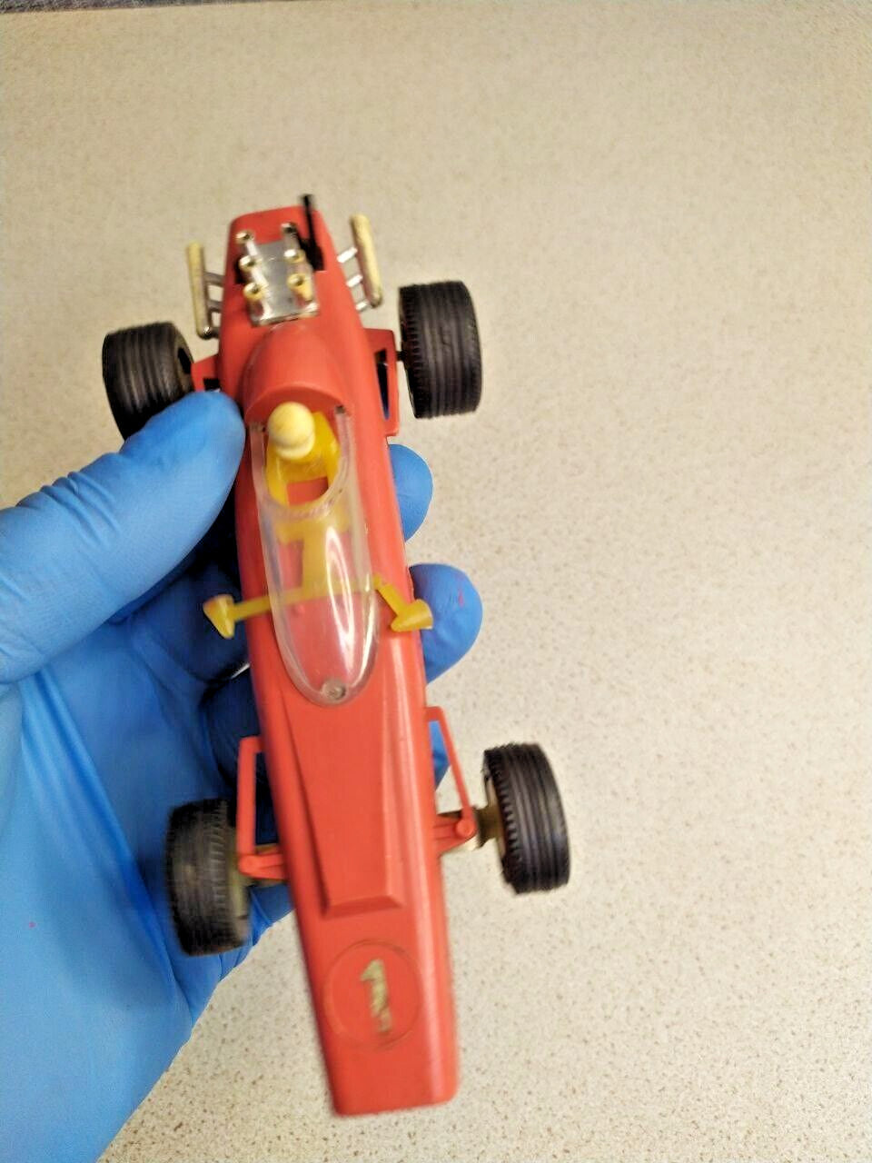 Underside of the USSR toy car with factory mark and price 1 ruble 10 kopecks – detail 9