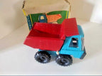 Soviet toy dump truck with blue plastic cab, red steel tipping bed and original box