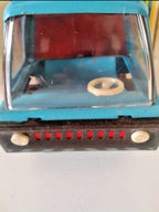 Vintage Soviet toy truck with tipping bed raised – detail 5