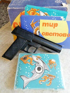 Vintage Soviet toy electronic pistol with detachable battery pack