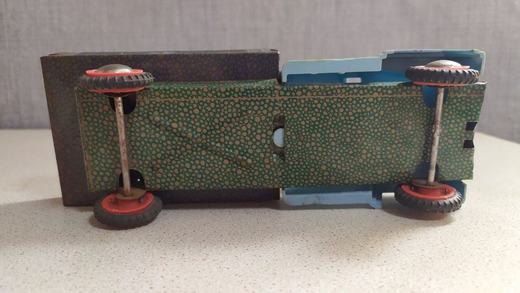 Old Soviet tin toy truck side view showing rolling wheels – detail 6