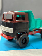 Soviet toy truck Strela dump truck with green plastic body and red metal chassis