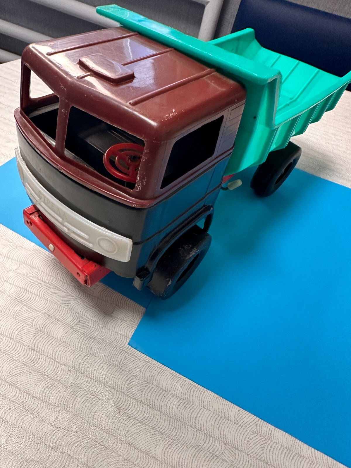 Strela logo on the white front grill of the vintage Soviet toy truck