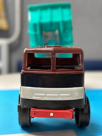 Strela logo on the white front grill of the vintage Soviet toy truck – detail 5