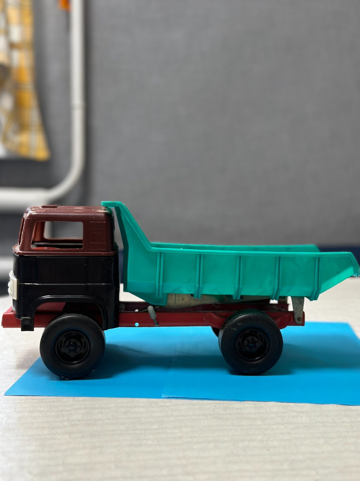 Old Soviet toy dump truck with body raised by hand – detail 6
