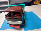Strela logo on the white front grill of the vintage Soviet toy truck – detail 8