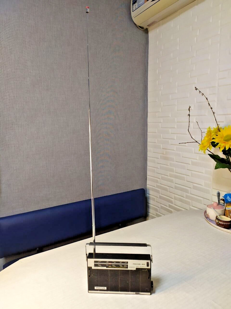 Old Soviet radio for sale with telescopic antenna fully extended