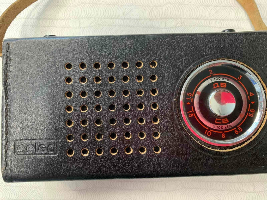Vintage USSR radio with side volume and power controls