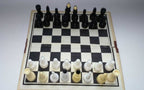 Vintage Soviet pocket chess pieces in black and cream plastic – detail 5
