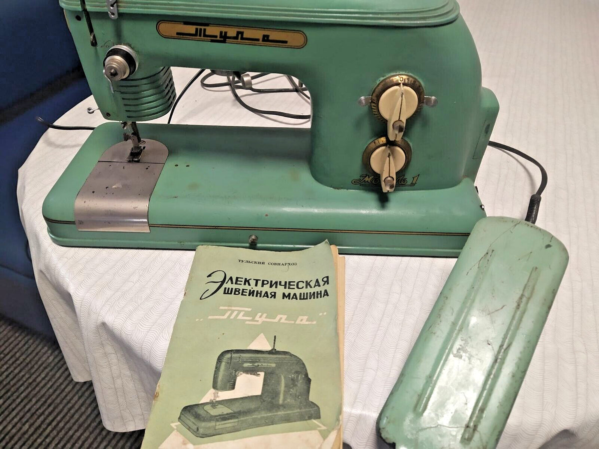 Soviet Tula electric sewing machine from 1959 in original mint green
