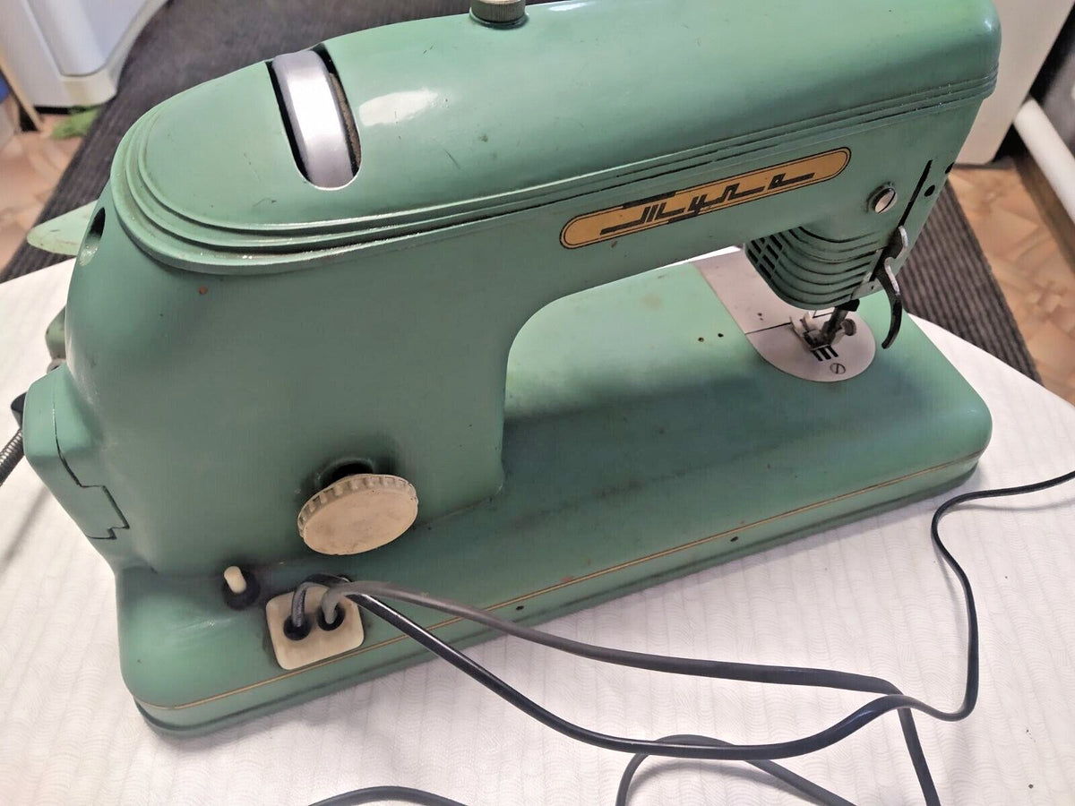 Vintage Tula sewing machine with aerodynamic space-age silhouette
