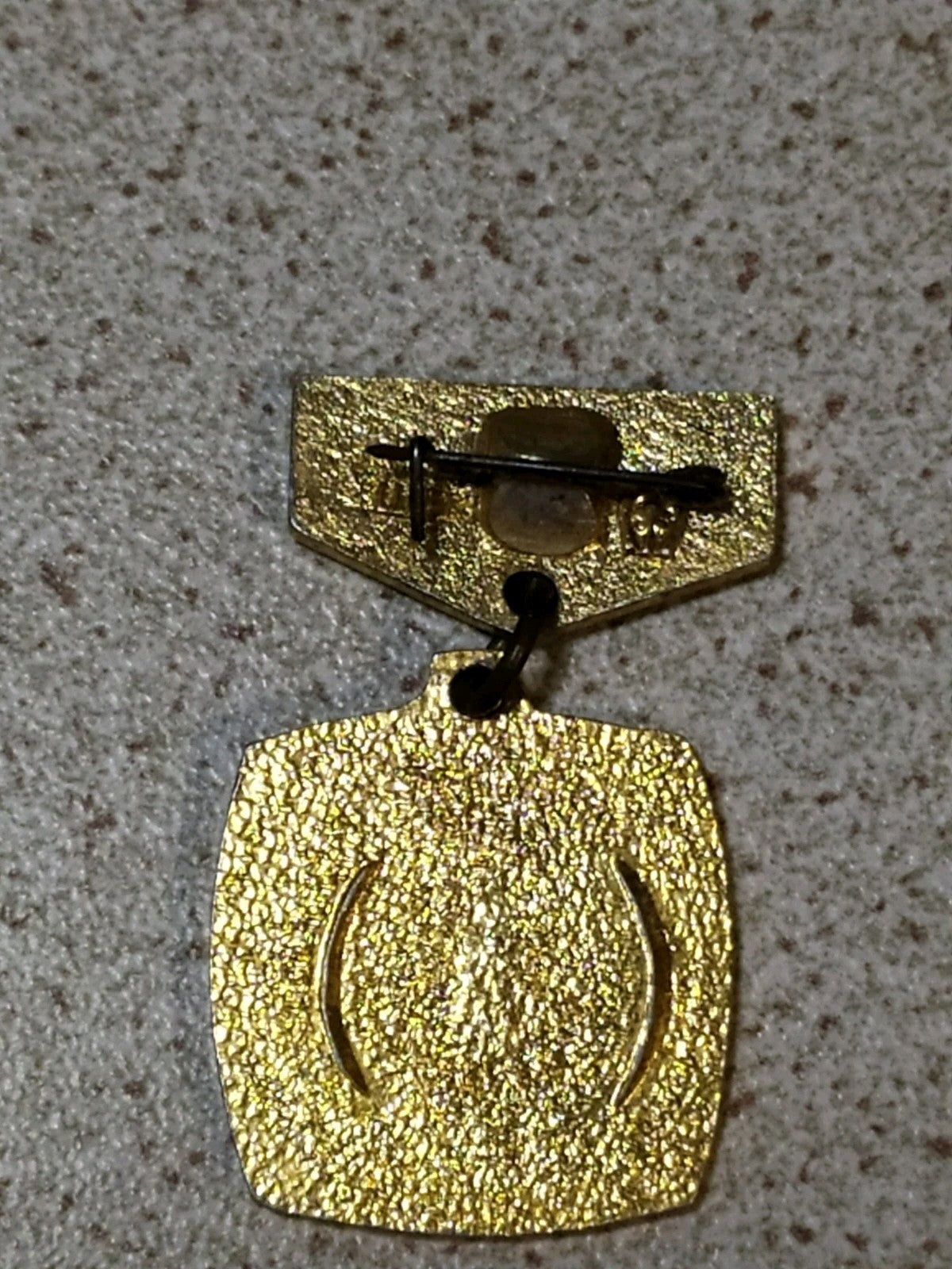 Reverse of old Soviet 1987 October Revolution pin