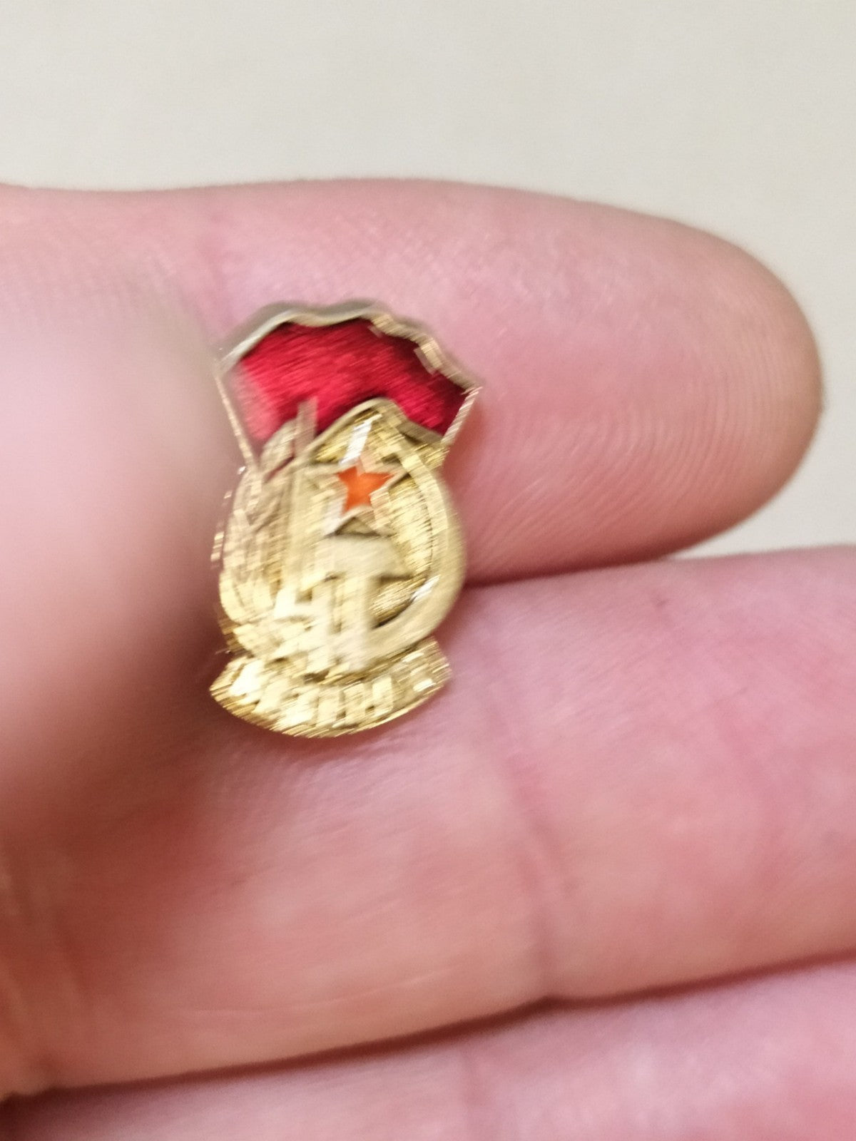 USSR enamel pin with red star and hammer and sickle
