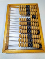 Russian schyoty counting frame made in USSR, side view of the wooden frame