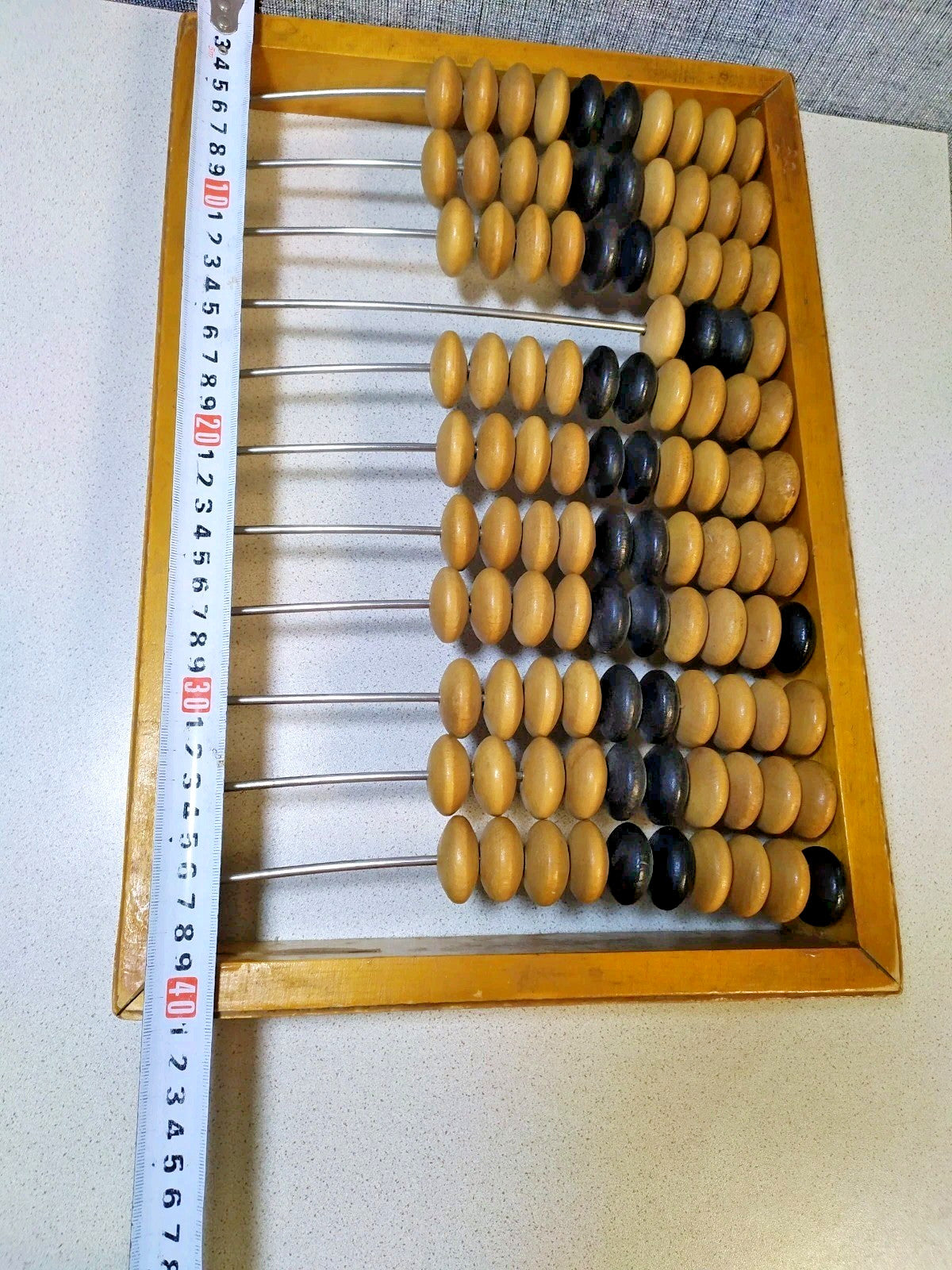 Vintage Soviet abacus, close-up of wooden beads and patina on the frame – detail 5